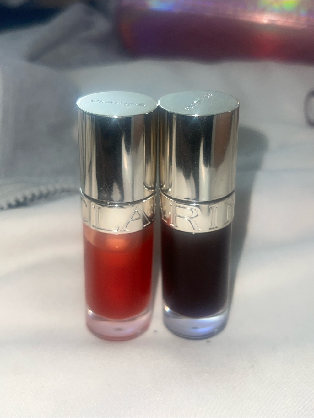 Clarins Lip Oil Duo — Bright Red & Deep Berry